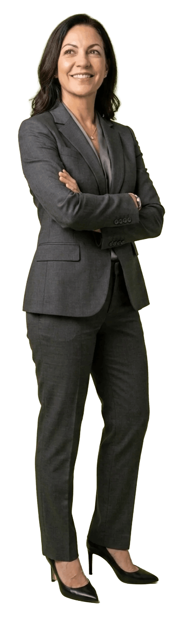 Female plastic surgeon standing confidently in a gray pinstripe suit, arms crossed, the surgeon her patient base is looking for