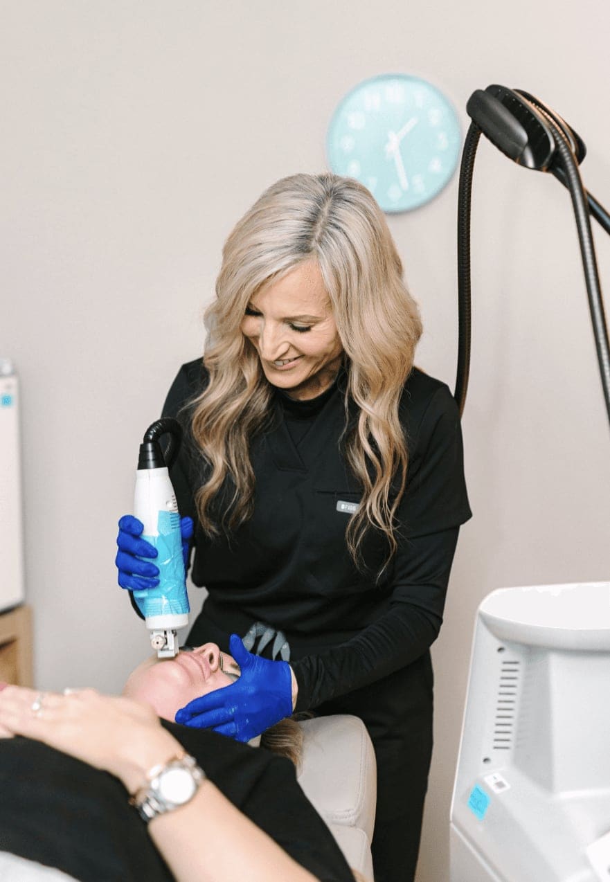 RSA staff performing a laser treatment — captured on the shoot
